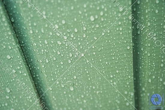 Raindrops on green Door
